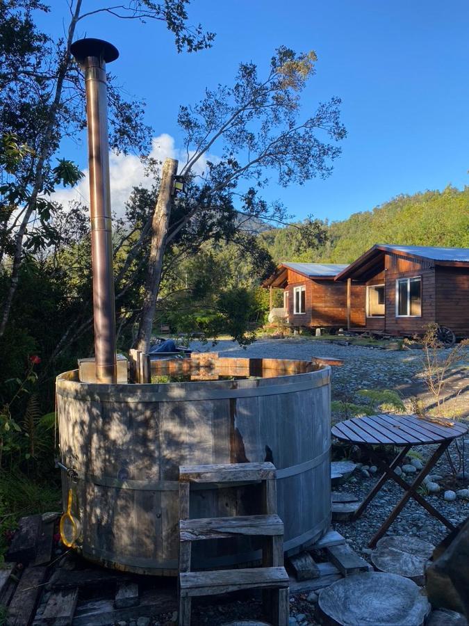 Cabanas & Tinajas Entre Volcanes Hornopiren Bagian luar foto